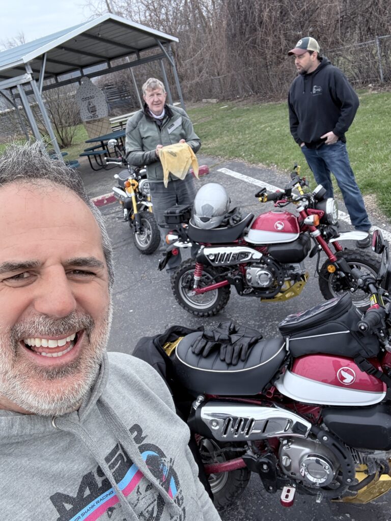 Retireman with his monkey bike and friends
